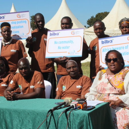 Members of Bio-diversity and Bio-safety Association of Kenya led by national co-ordinator Anne Maina (right) during a press briefing in Nanyuki, Laikipia county, on October 15, 2025